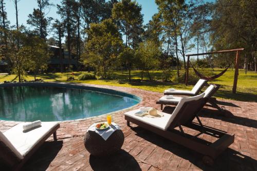 泳池, 南德麗德旅館 (Nande Reta) in 哥洛尼亞卡洛斯佩萊格里尼