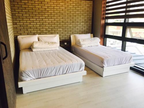 White Windmill Guesthouse White Windmill Guesthouse is a popular choice amongst travelers in Mokpo-si, whether exploring or just passing through. The property has everything you need for a comfortable stay. Service-minded staf