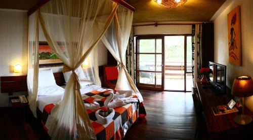 Gastenkamer, Hotel Club du Lac Tanganyika in Bujumbura