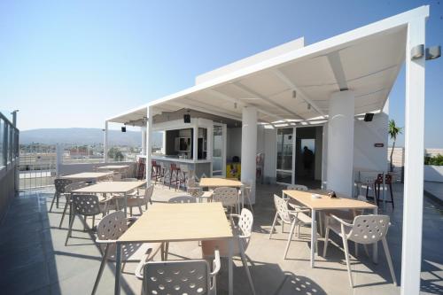 Foto - Astron Suites & Apartments