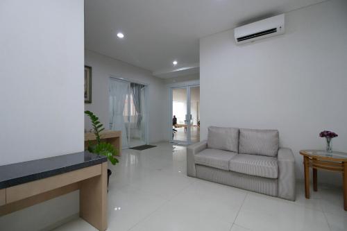 jaettu olohuone/TV alue, MK House SCBD in Sudirman