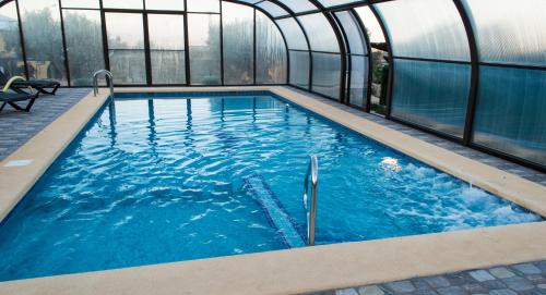 สระว่ายน้ำ, Casas Rurales Los Olivos de Noja in ลาแมนกาคอสตาคาลิดา