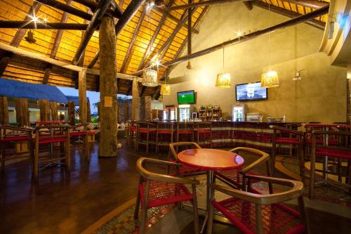 Restaurant, The Royal Senchi Hotel and Resort in Akosombo