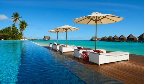 مسبح, Mercure Maldives Kooddoo - Adults-Only Escape with 50% off return domestic transfer for 2 adults in هوفادو أتول