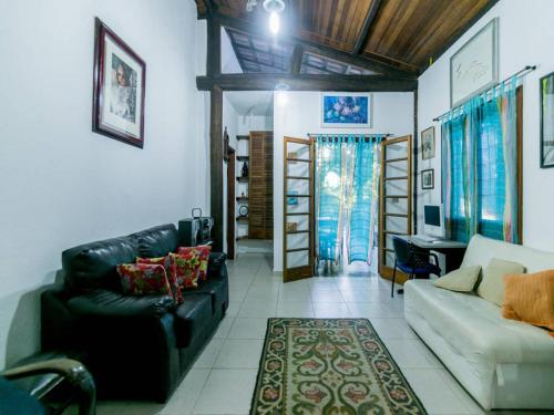 gedeelde lounge/tv-ruimte, Ilha House Suites in Cocaia