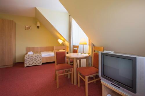 Chambre triple, 3 lits