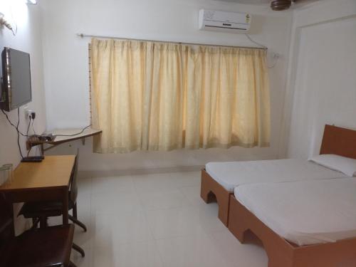 Hotel Surya Stop at Hotel Surya to discover the wonders of Mangalore. Offering a variety of facilities and services, the property provides all you need for a good nights sleep. Service-minded staff will welcome 