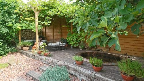 Pezsgőfürdő, La Ferme Oasis in Goussainville