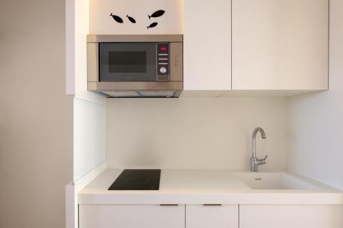 廚房, Apartamentos Portu Saler in 福爾門泰拉