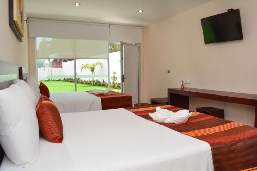 Hotel Quinta Tequisquiapan Hotel Quinta Tequisquiapan is perfectly located for both business and leisure guests in Tequisquiapan. The property has everything you need for a comfortable stay. Service-minded staff will welcome an