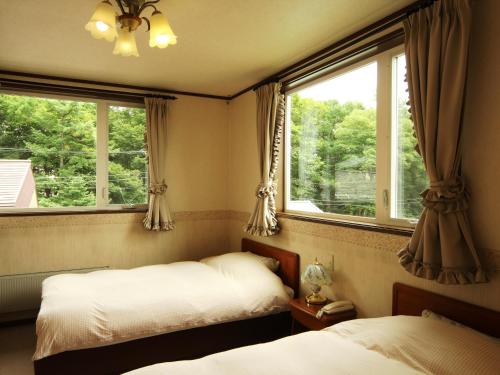 Pension Raisin Pension Raisin is conveniently located in the popular Kusatsu area. The property offers guests a range of services and amenities designed to provide comfort and convenience. Service-minded staff will 