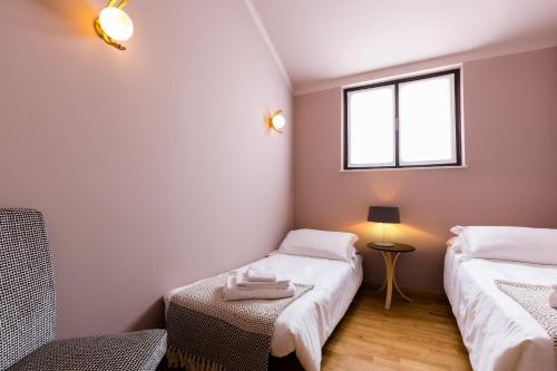Escalus Luxury Suites Verona Aparthotel - main image