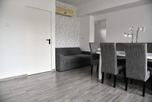 Közös társalgó / TV, aQuarium City Vendeghaz in Abádszalók