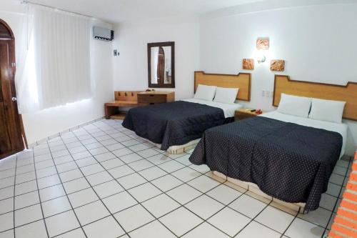 Costa Alegre Hotel & Suites Set in a prime location of Rincon De Guayabitos, Costa Alegre Hotel & Suites puts everything the city has to offer just outside your doorstep. The property offers a high standard of service and amenit