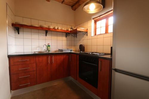 廚房, Matjiesvlei Retreat Oudehuiskloof in 卡利茨多普