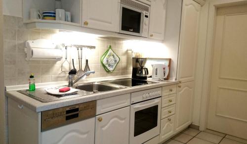 Konyha, Ferienwohnanlage Dunenhaus in Hohwacht