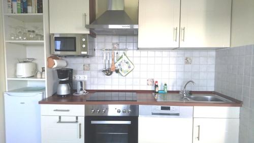 Konyha, Ferienwohnanlage Dunenhaus in Hohwacht