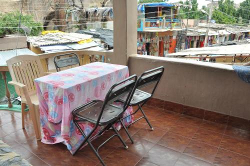 Balcony/terrace, Vicky's Home Stay  Hampi in Hampi