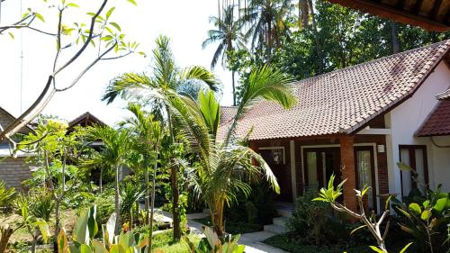 Enak Bungalow - Tap to explore photos