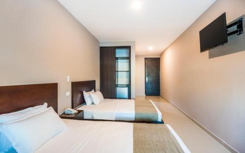 Ribai Hotels - Barranquilla Ribai Hotel Barranquilla is conveniently located in the popular North Centro Historico area. The property features a wide range of facilities to make your stay a pleasant experience. Service-minded st