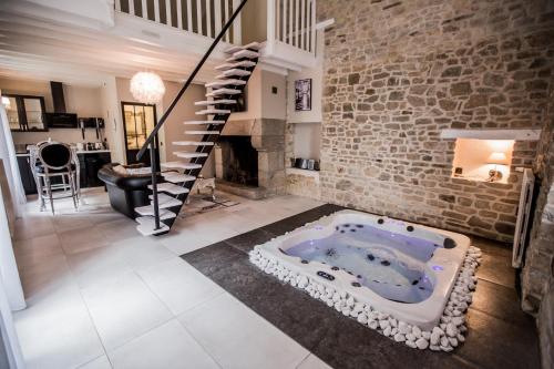 Au domaine des anges Gites avec Jacuzzi privatif dans la chambre