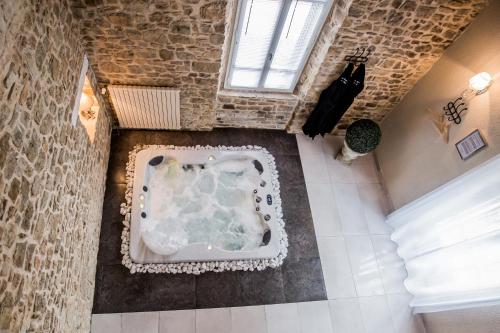 Au domaine des anges Gites avec Jacuzzi privatif dans la chambre