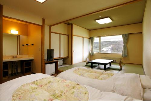 Quadruple Room with Shared Bathroom