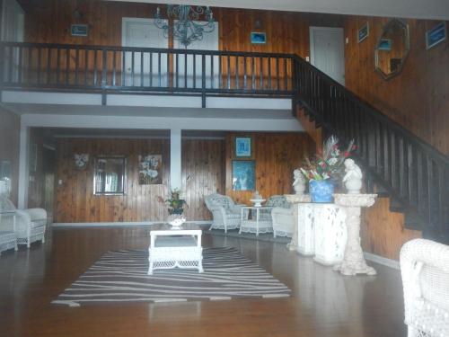 صالة مشتركة/ منطقة التلفزيون, Hotel Millenia Samoa in ابيا
