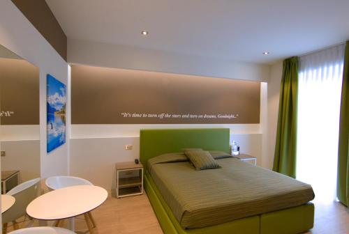 Hotel Ideal - Tap to explore photos