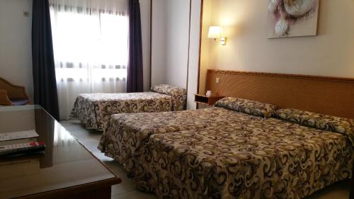 Twin Room with Extra Bed (2 Adults + 1 Child)