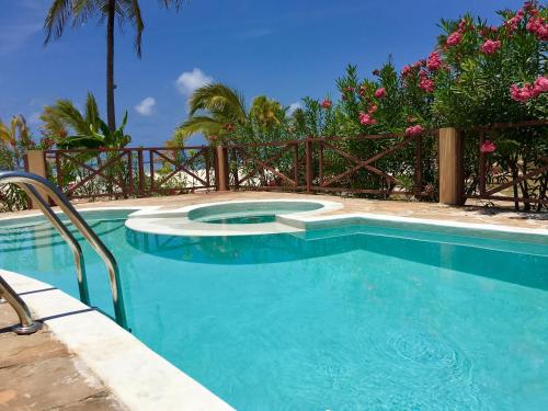 The Sands Beach Resort Located in Dongwe, The Sands Beach Resort is a perfect starting point from which to explore Zanzibar. Featuring a satisfying list of amenities, guests will find their stay at the property a comfortabl