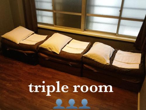 Triple Room (Futon on Wood Flooring)