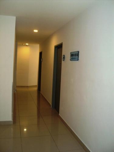 a hallway with a door leading to a hallway, GM City Hotel in Klang