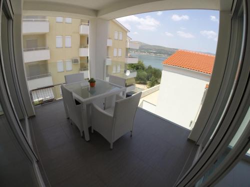 One-Bedroom Apartment with Balcony and Sea View - First Floor