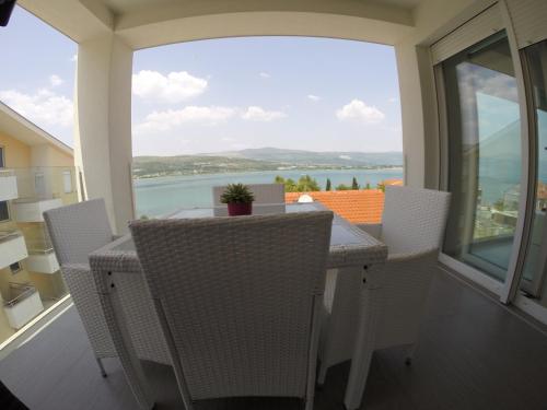 One-Bedroom Apartment with Balcony and Sea View - Second Floor