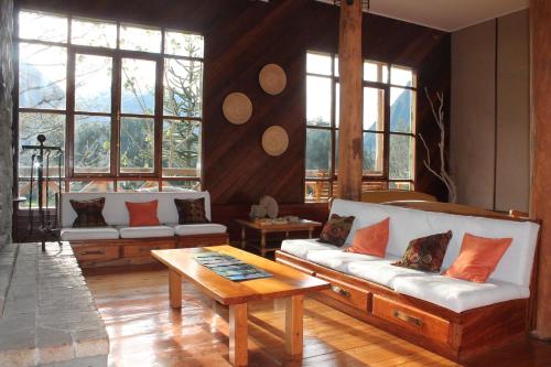 Pubi/sohvabaar, Mitico Puelo Lodge in Puelo