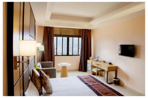 2000 Hotel Downtown Kigali The 4-star 2000 Hotel Downtown Kigali offers comfort and convenience whether youre on business or holiday in Kigali. The property offers a high standard of service and amenities to suit the individua