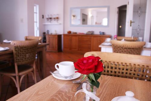 パラディソ ゲストハウス&セルフ ケータリング コテージ