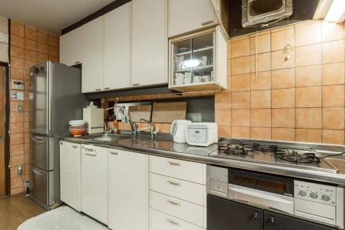 Shared lounge/TV area, Calligraphy House in Fushimi