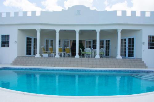 Swimming pool, Castles In Paradise Villa Resort in Vieux Fort