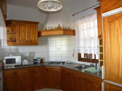 廚房, Apartamento en piscinas naturales. in 巴洛文托