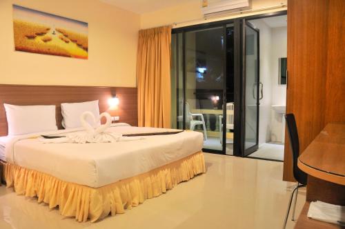 The Wave Patong Boutique Hotel - Tap to explore photos