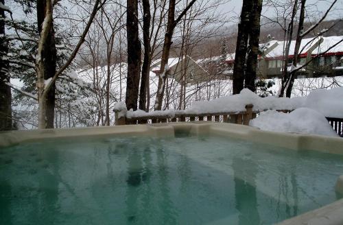 Badestamp, Chalet 9017 Chemin des Alpages by Les Chalets Alpins in Stoneham (QC)