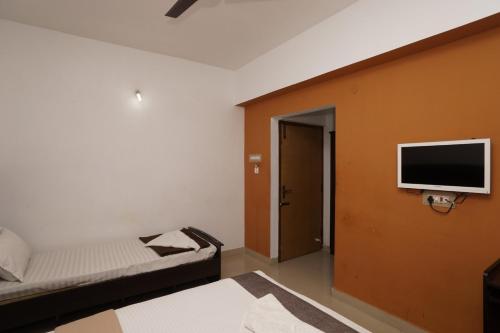 KV Residency Set in a prime location of Coimbatore, KV Residency puts everything the city has to offer just outside your doorstep. Featuring a complete list of amenities, guests will find their stay at the propert
