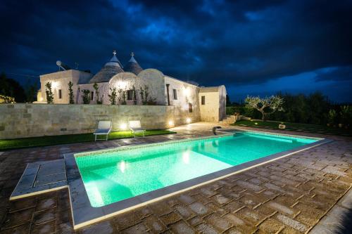 Trulli Magravì - Apparthotel chambre d'hôte Masseria Orimini