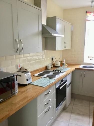 кухня, Mount Pleasant Apartments in Бомарі