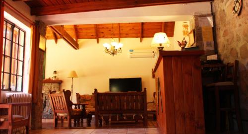 Koplietošanas atpūtas telpa ar TV, Terrazas de Cruz Chica. in La Cumbre