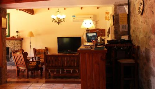 Koplietošanas atpūtas telpa ar TV, Terrazas de Cruz Chica. in La Cumbre