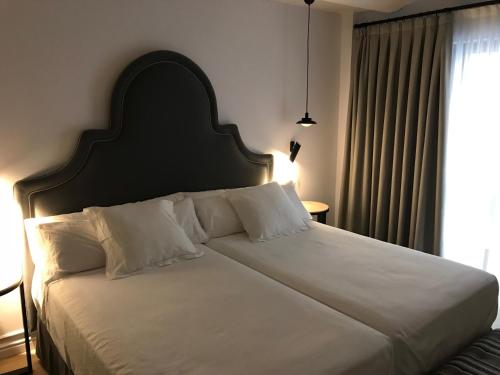 Apartamentos Hom Sevilla - image 13