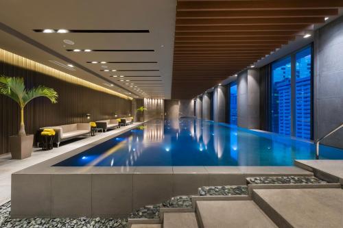 Swimming pool, Marco Polo Ortigas Manila near Belo Medical Group